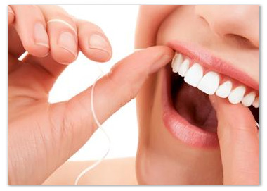 Dr. Vasilakos, flossing teeth teeth